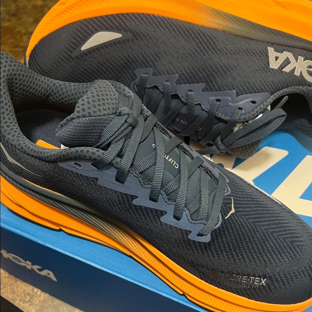 Hoka Blue and Orange Athletic Shoes